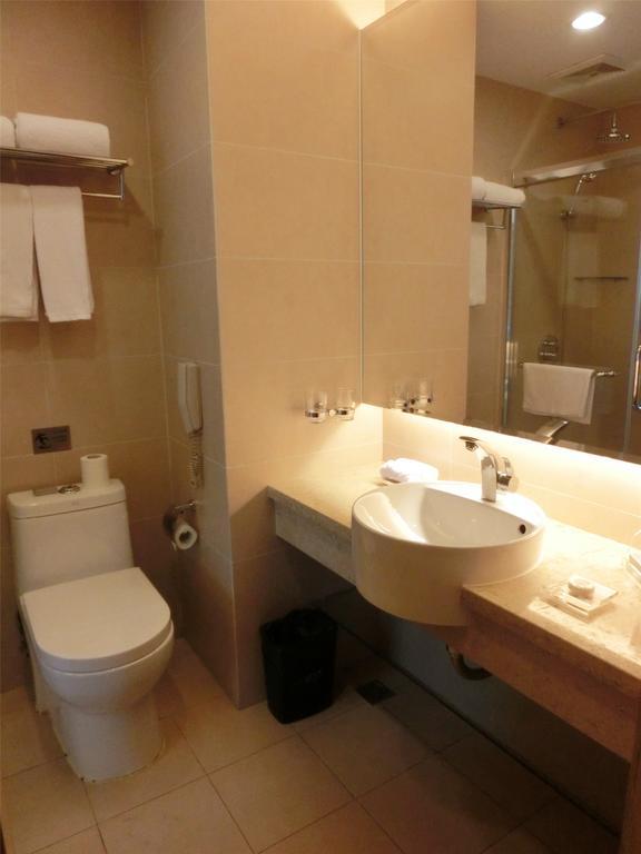 Guangzhou Bauhinia Hotel Стая снимка