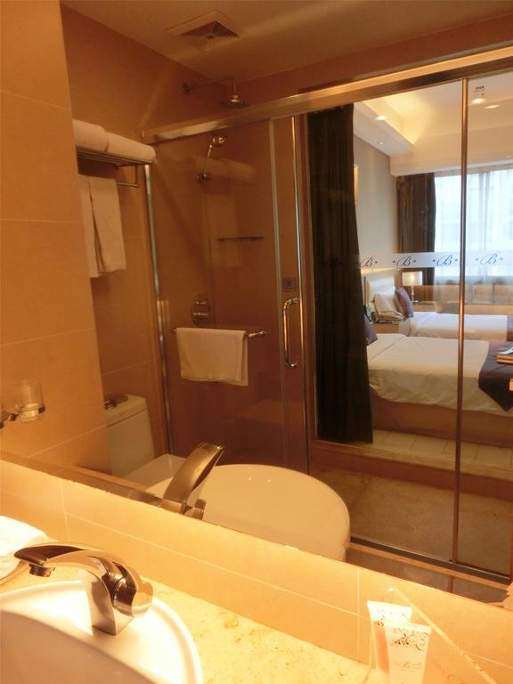 Guangzhou Bauhinia Hotel Стая снимка