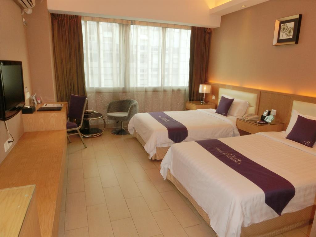 Guangzhou Bauhinia Hotel Стая снимка