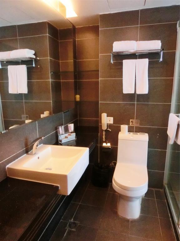 Guangzhou Bauhinia Hotel Стая снимка
