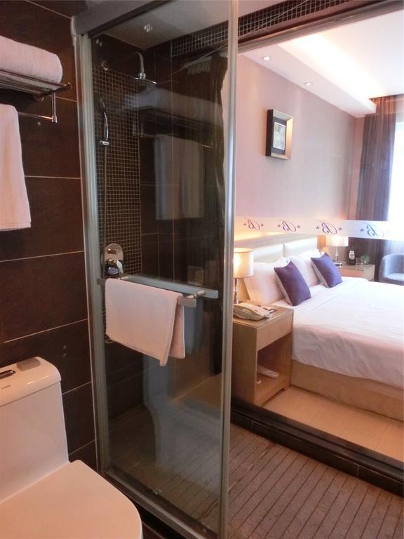 Guangzhou Bauhinia Hotel Стая снимка
