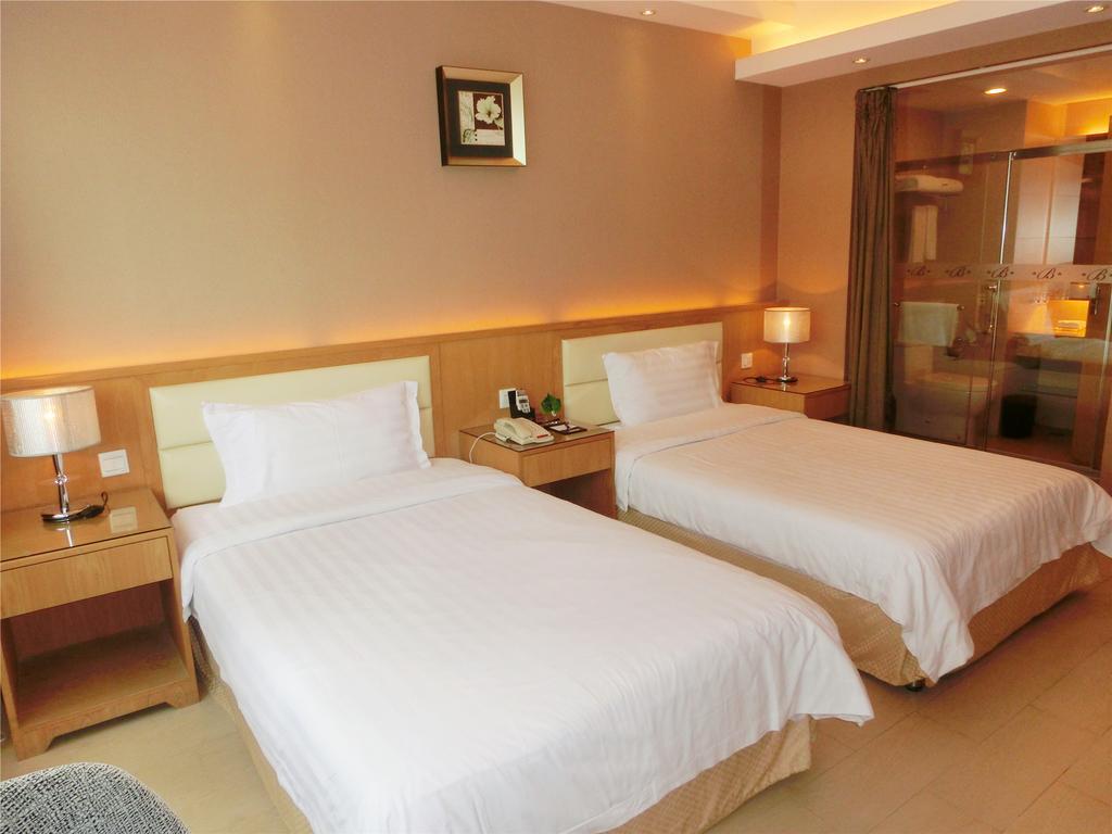 Guangzhou Bauhinia Hotel Стая снимка