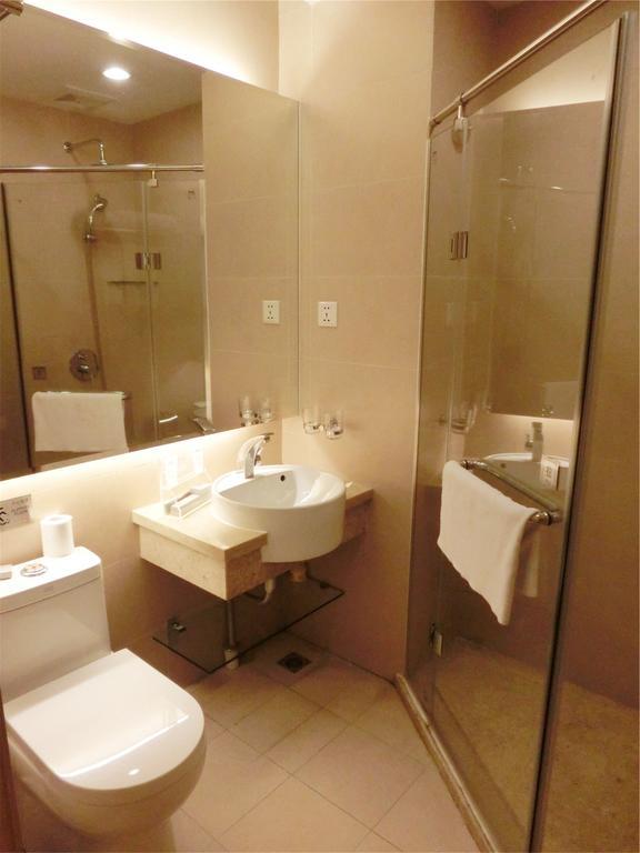 Guangzhou Bauhinia Hotel Стая снимка