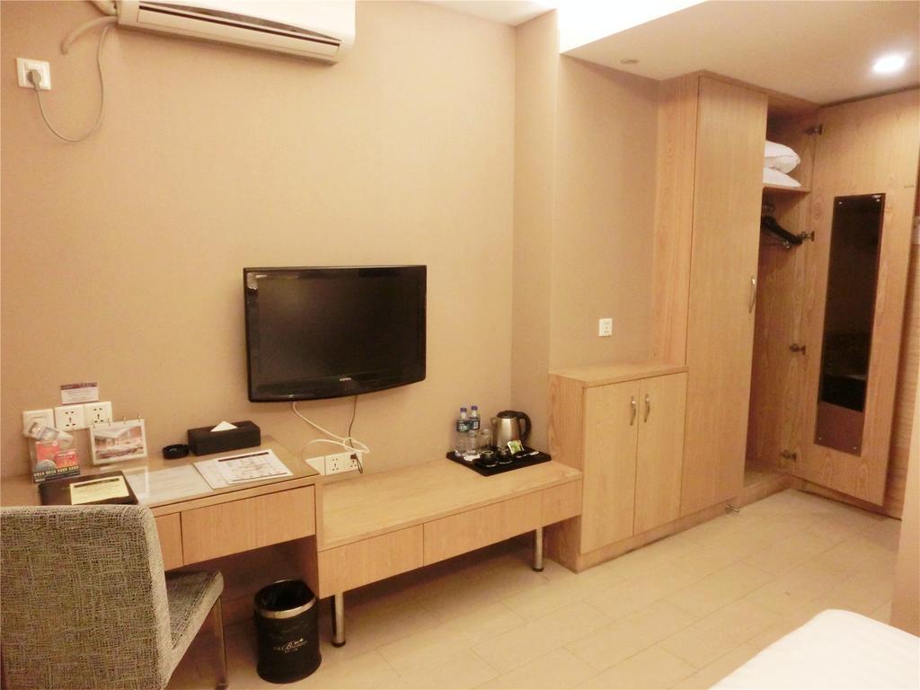 Guangzhou Bauhinia Hotel Стая снимка